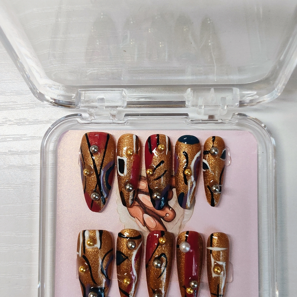 Gold and Red Artistic Nail Set
